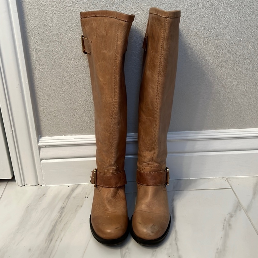 Steve Madden boots size 7. Slightly worn scuff on toe. Good condition!